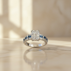 Blue Sapphire Emerald Cut Solitaire Ring with Diamond Baguettes