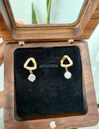 Triangle shaped studded earrings with hanging diamonds on pure 925 Silver