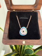 Evil eye pendant with chain in Rose gold finish