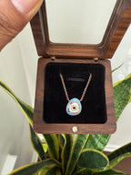 Evil eye pendant with chain in Rose gold finish