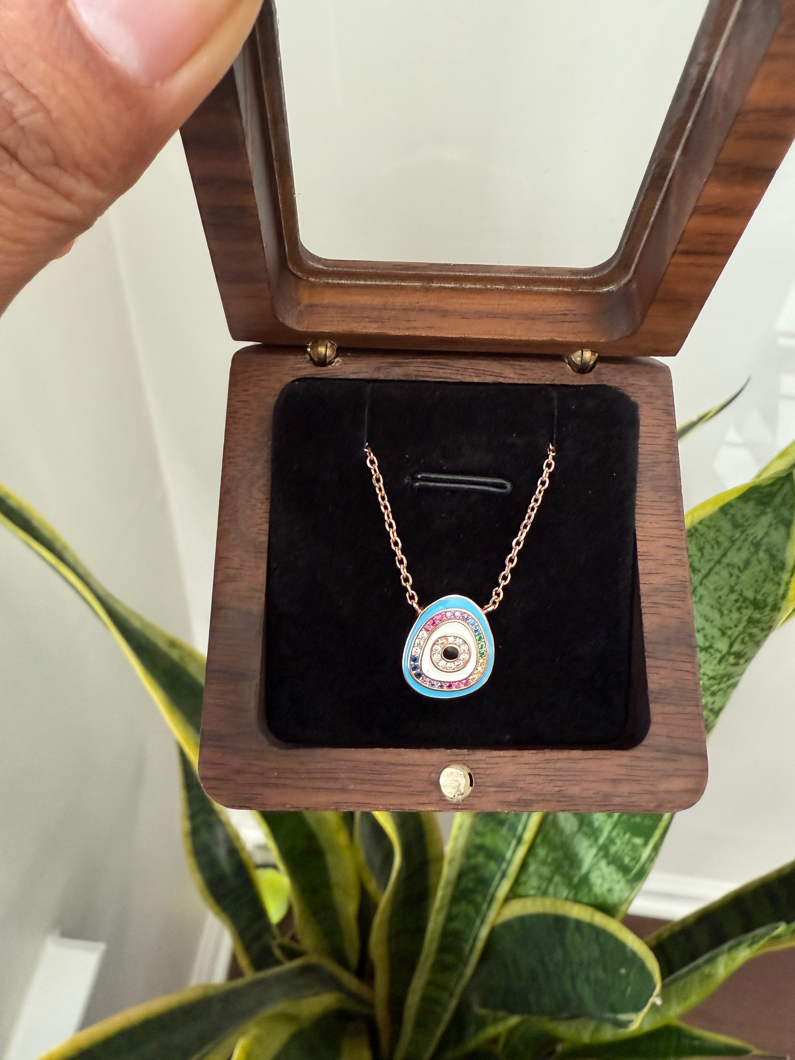 Evil eye pendant with chain in Rose gold finish