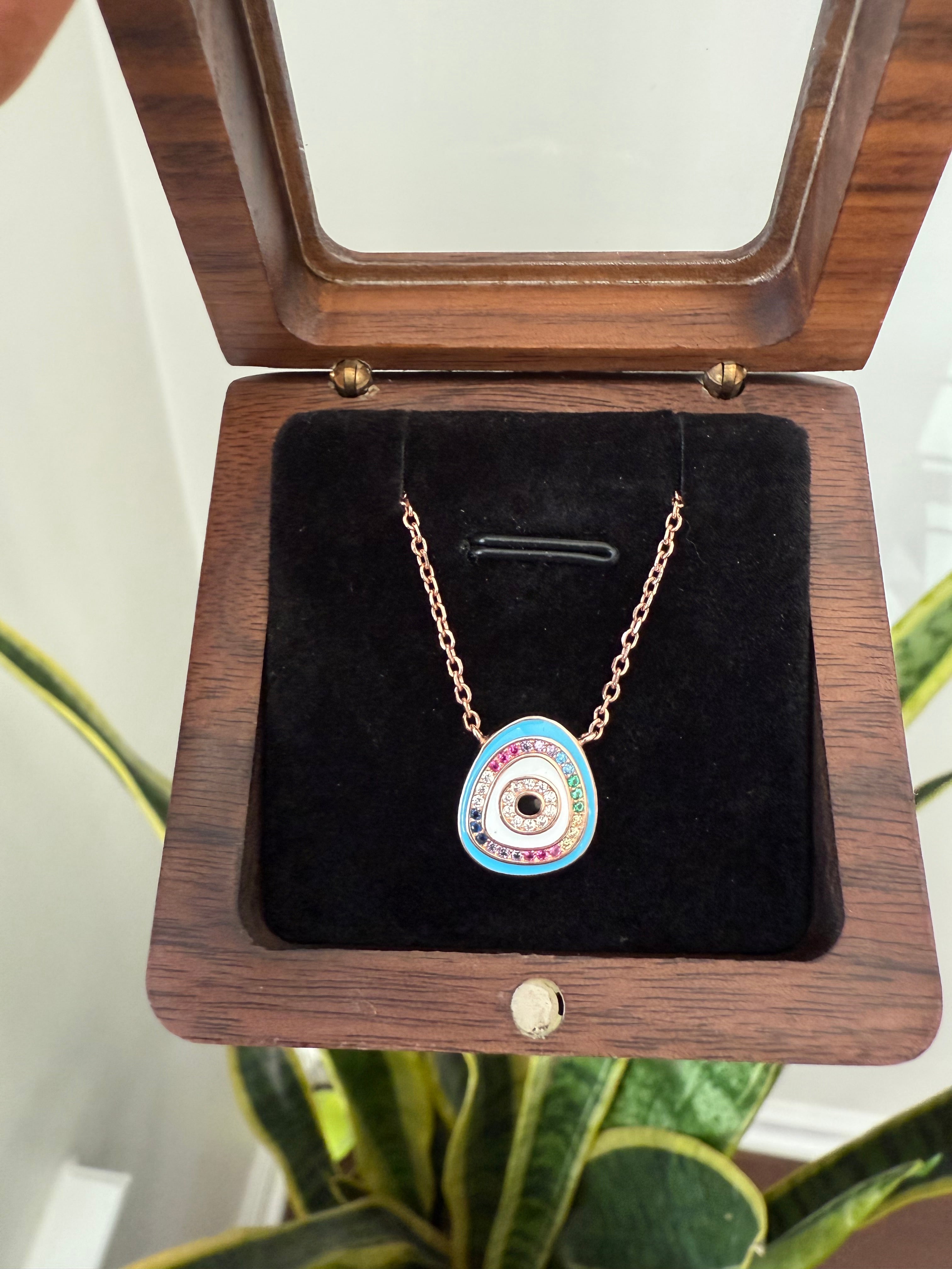 Evil eye pendant with chain in Rose gold finish