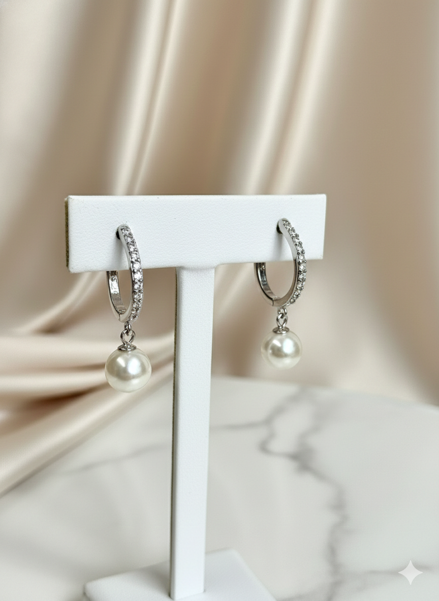 RHEA Pearl Huggies on Pure 925 Silver