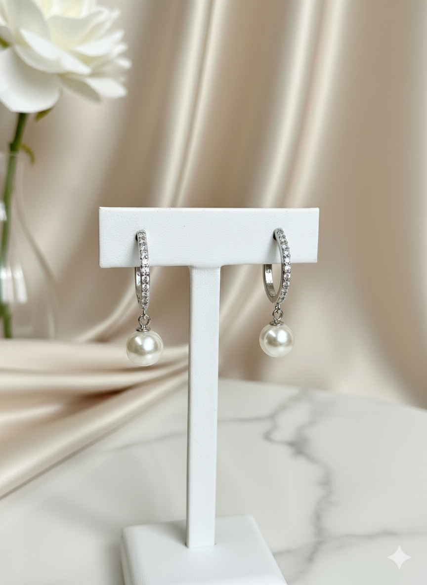 RHEA Pearl Huggies on Pure 925 Silver