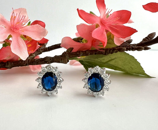 Blue Sapphire Oval REINA Solitaire with Round Cut Diamond Cluster Studs