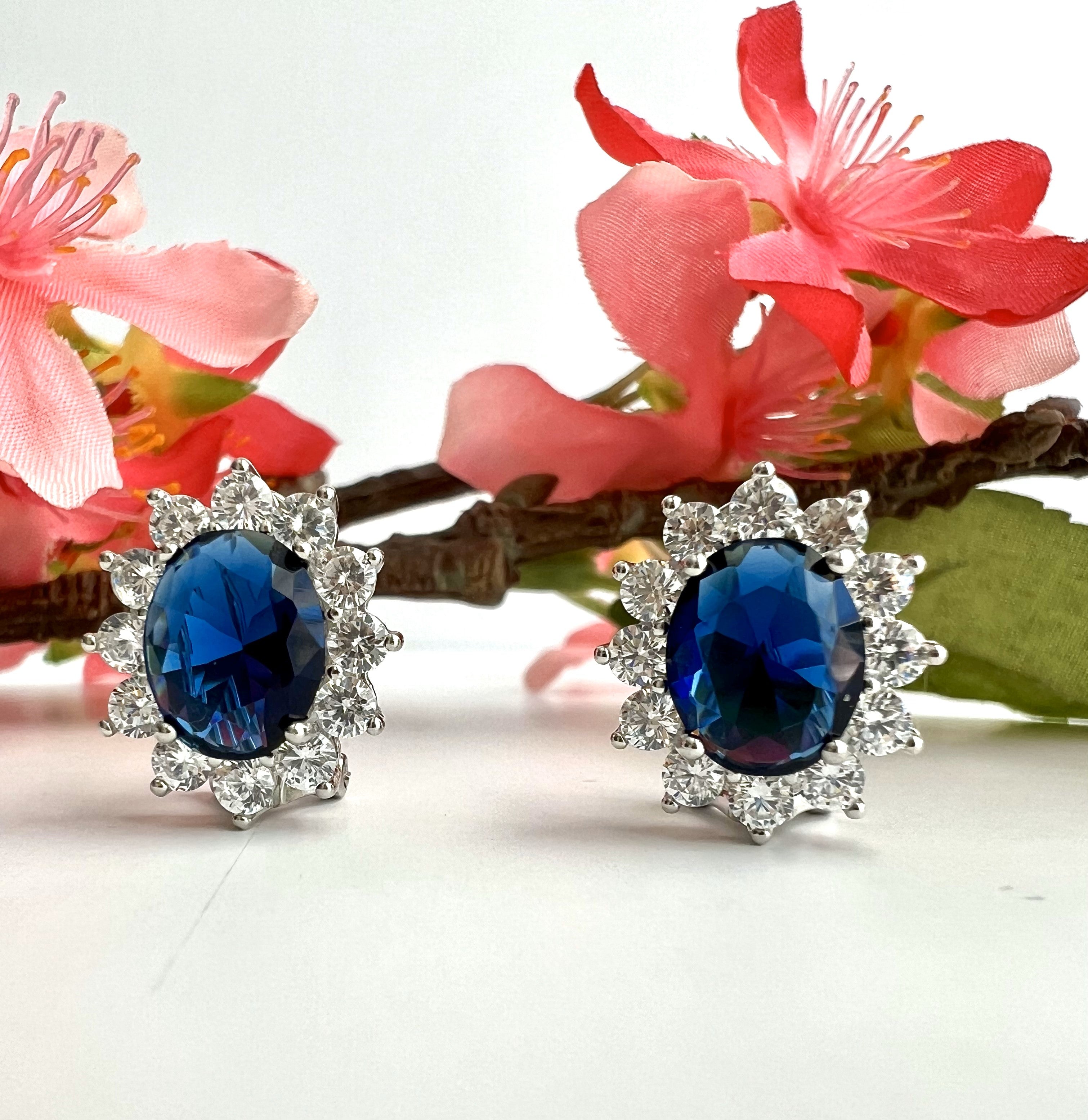 Blue Sapphire Oval REINA Solitaire with Round Cut Diamond Cluster Studs