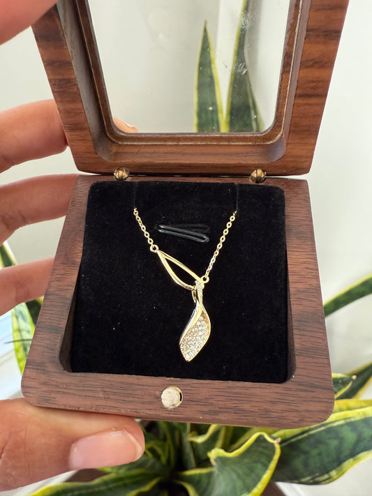 Exclusive Entangled in Love Diamond Studded Leaf Pendant with Chain